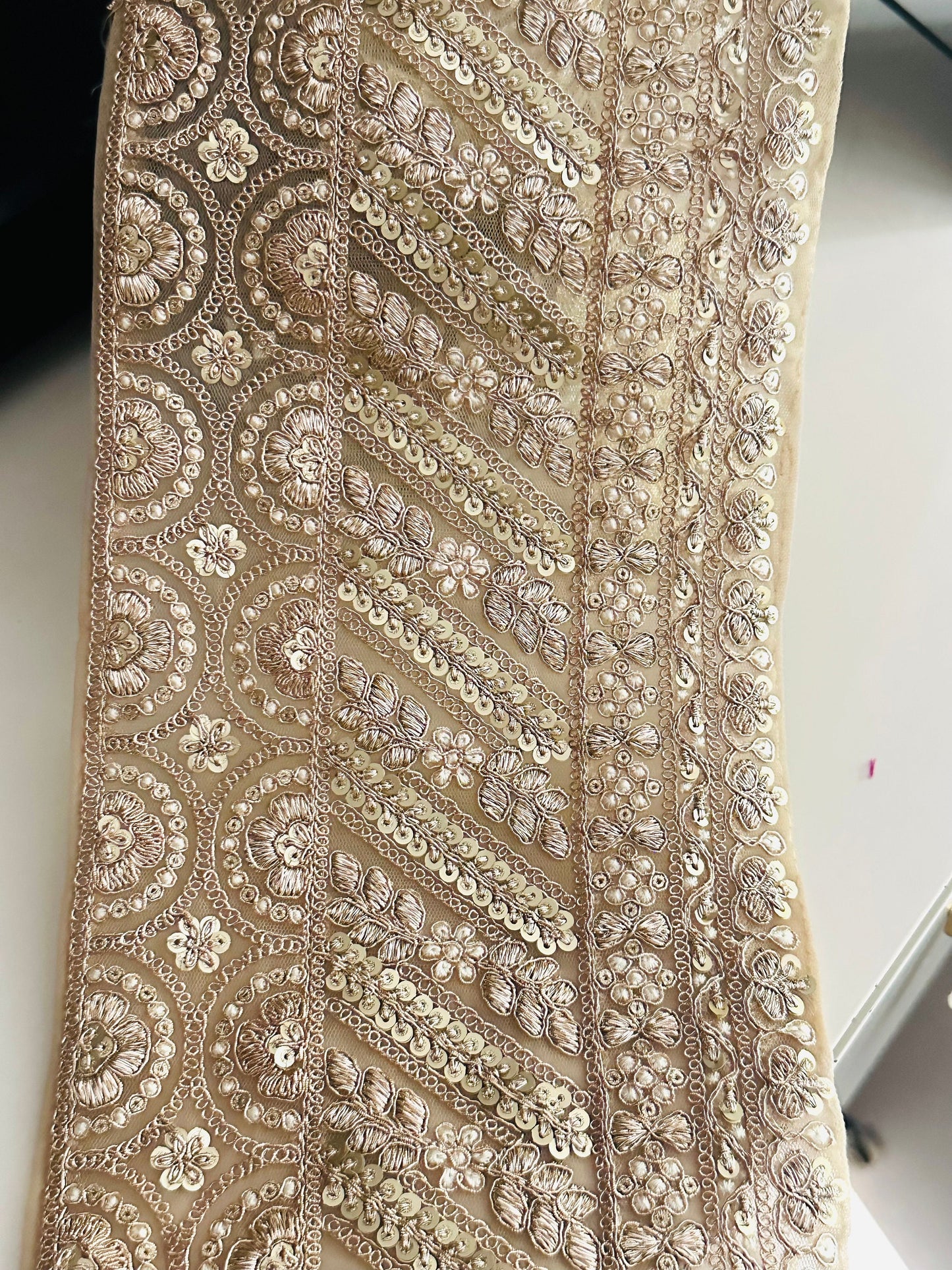 "15cm cream and gold lace trim with pearls, mirrors, and sequin embroidery, perfect for bridal and festive decor."
