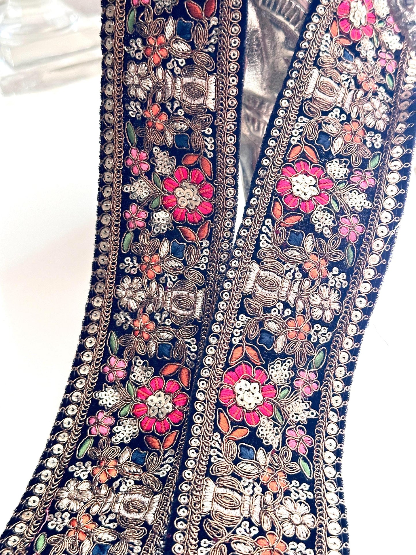 Victorian multicolour lace trim used as a decorative accent on a vintage-inspired dress, demonstrating its versatility for fashion and costume design