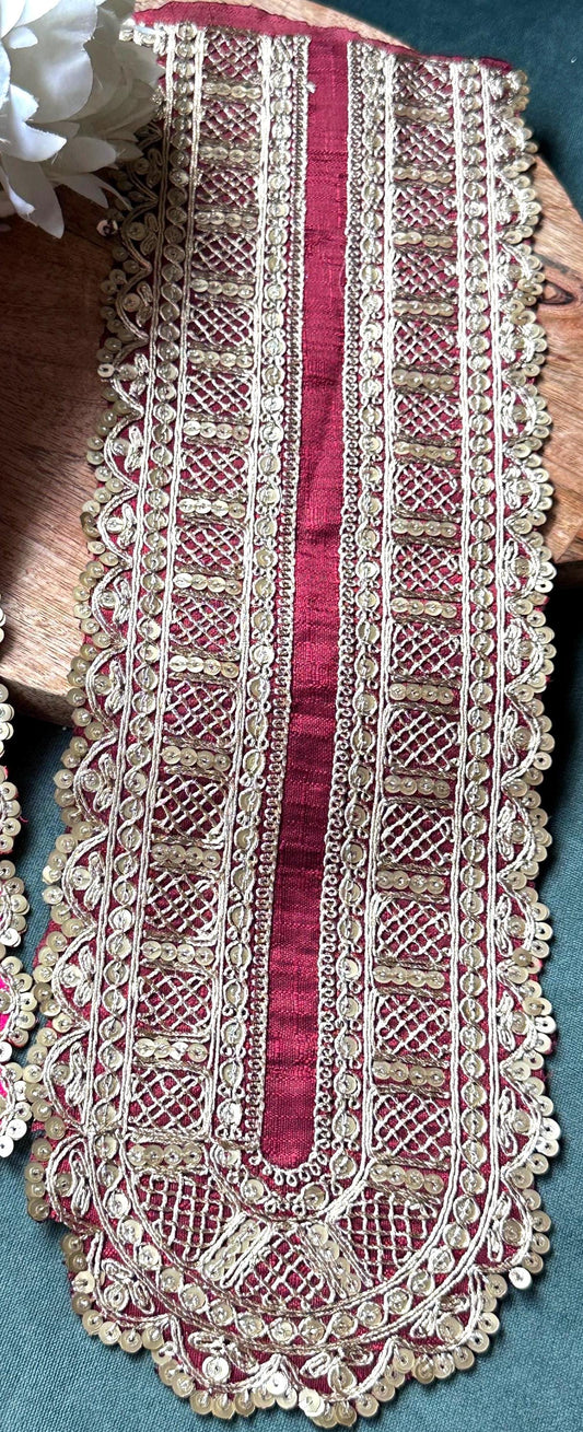 Intricate gold embroidered neckline patch with floral design and beading