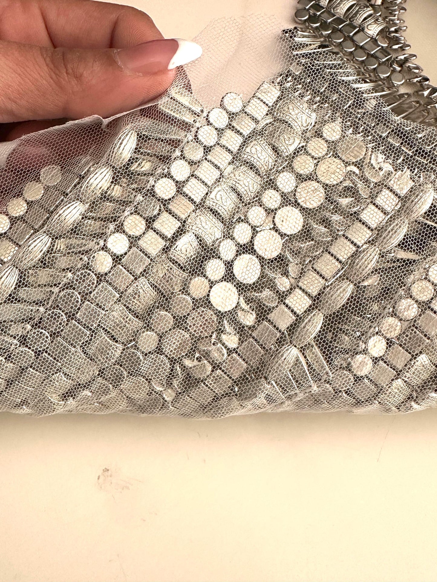 Close-up of the bridal choker with intricate mirror detailing.