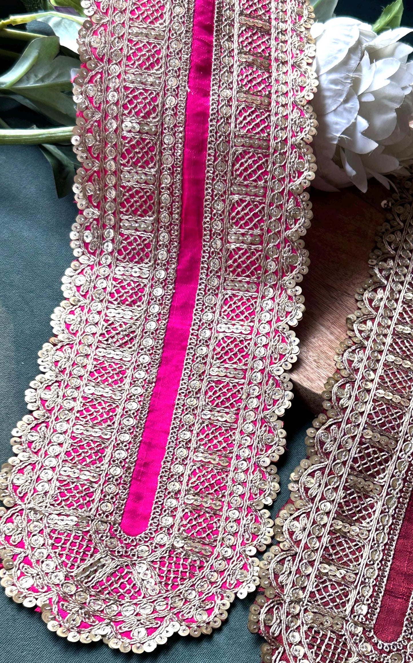 Close-up of beaded gold applique for bridal and wedding dresses