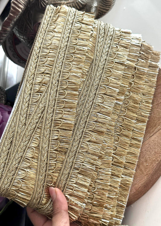 Luxury gold craft lace ribbon ideal for sewing, wedding dress embellishment, and DIY fashion.