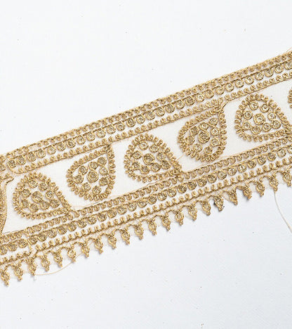 Gold with zari threadwork in paisley pattern on tissue base