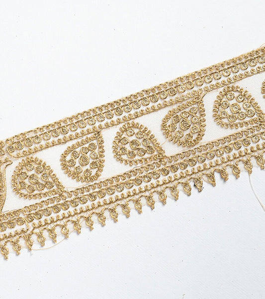 Gold with zari threadwork in paisley pattern on tissue base