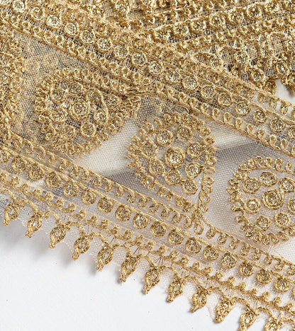 Gold with zari threadwork in paisley pattern on tissue base