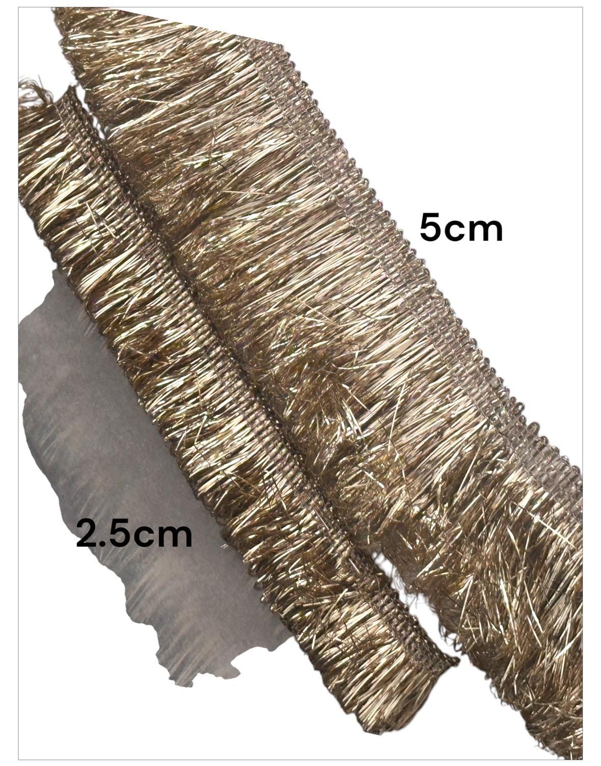 Intricate gold metallic lace with Sabyasachi-inspired border design, perfect for embellishments, special occasion decor, and creative gift wrapping