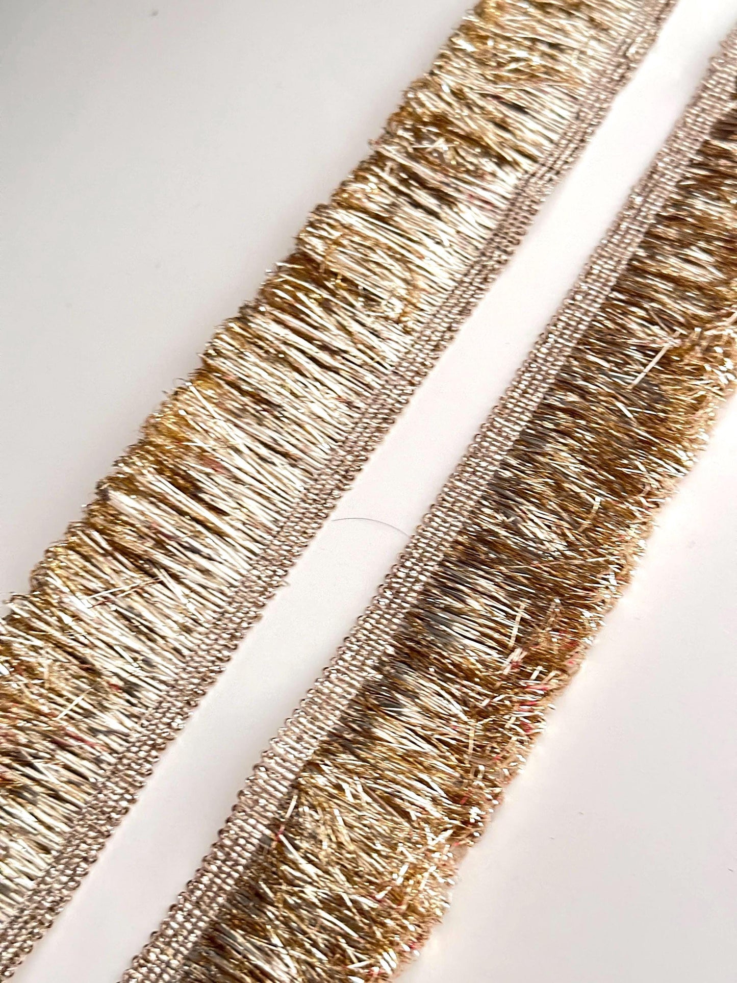 Intricate gold metallic lace with Sabyasachi-inspired border design, perfect for embellishments, special occasion decor, and creative gift wrapping