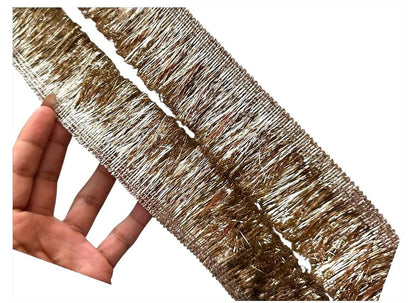 Intricate gold metallic lace with Sabyasachi-inspired border design, perfect for embellishments, special occasion decor, and creative gift wrapping