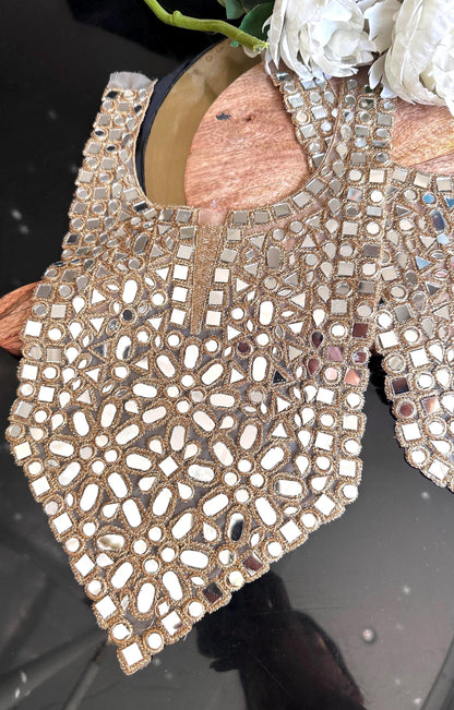 Handmade mirror work applique with intricate floral design and reflective mirrors